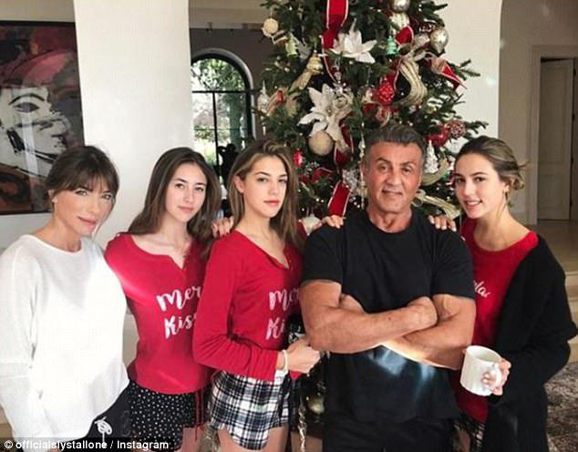 Happy day: Stallone posed with his (L-R) wife Jennifer Flavin and daughters Scarlet, Sistine and Sophia 