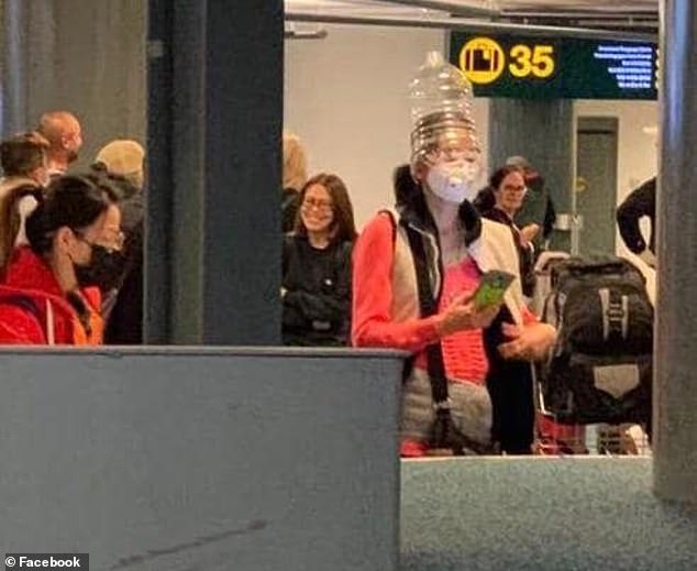 Other photographs at Vancouver airport show a woman with a plastic water container over her head
