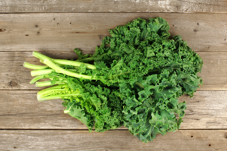 bigstock Bunch of kale over a wooden ba 85955297