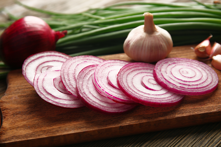 bigstock Red onions circles green onio 109952531